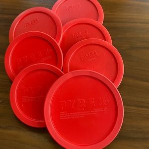 15 red Pyrex brand lids